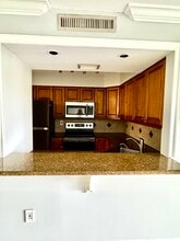2334 S Cypress Bend Dr, Unit 404 in Pompano Beach, FL - Building Photo - Building Photo