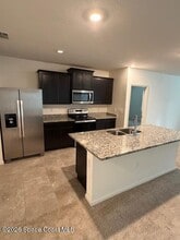 4667 Magenta Isles Dr in Melbourne, FL - Building Photo - Building Photo