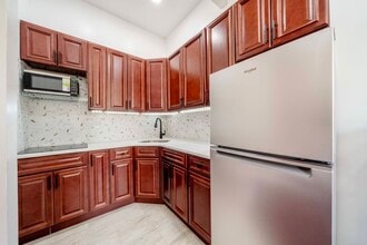 211 W 122nd St in New York, NY - Building Photo - Building Photo