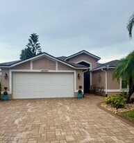 20700 Persimmon Pl in Estero, FL - Building Photo