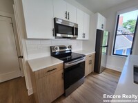 69 Bailey St, Unit 308 in Boston, MA - Foto de edificio - Building Photo