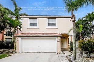 7594 Oak Grove Cir in Greenacres, FL - Building Photo