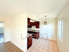 7039-7039 Miles Ave in Huntington Park, CA - Building Photo - Building Photo