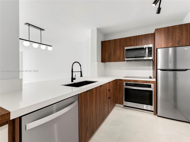 property at 5601 Collins Ave