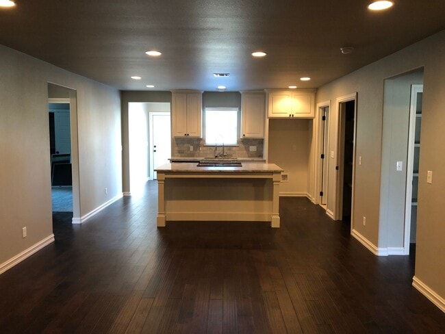 property at 327 E Will Rogers Blvd