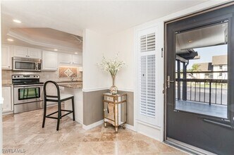 1530 Imperial Golf Course Blvd, Unit 322 in Naples, FL - Building Photo - Building Photo