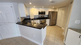 2351 Douglas Rd, Unit 1006 in Miami, FL - Building Photo