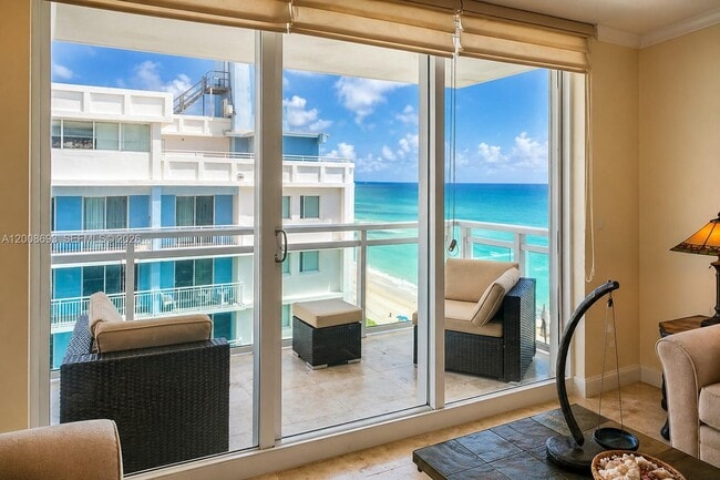 property at 6917 Collins Ave