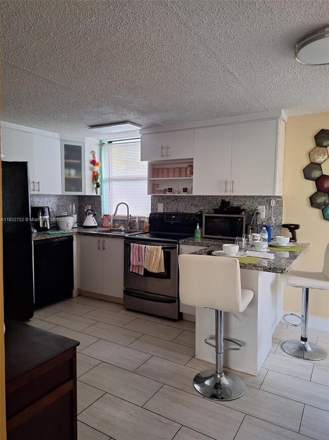 property at 2485 NE 135th Terrace