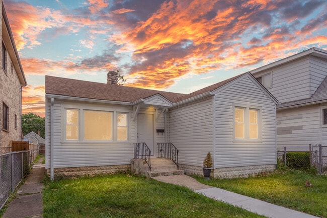 property at 3304 N Ozanam Ave