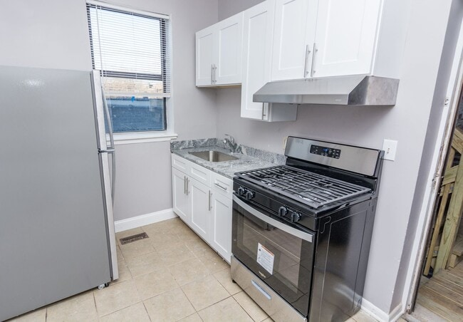 118 N Kostner Ave, Unit 3