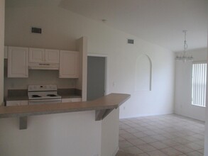 1426 NW 12th St, Unit 2 in Cape Coral, FL - Building Photo - Building Photo