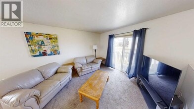 10605-10102 102 St in Grande Prairie, AB - Building Photo - Building Photo