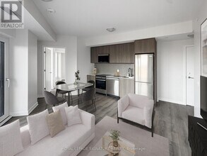 7439 Kingston Rd in Toronto, ON - Building Photo - Building Photo