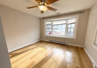 114 Buttonwood St, Unit 1 in Boston, MA - Foto de edificio - Building Photo