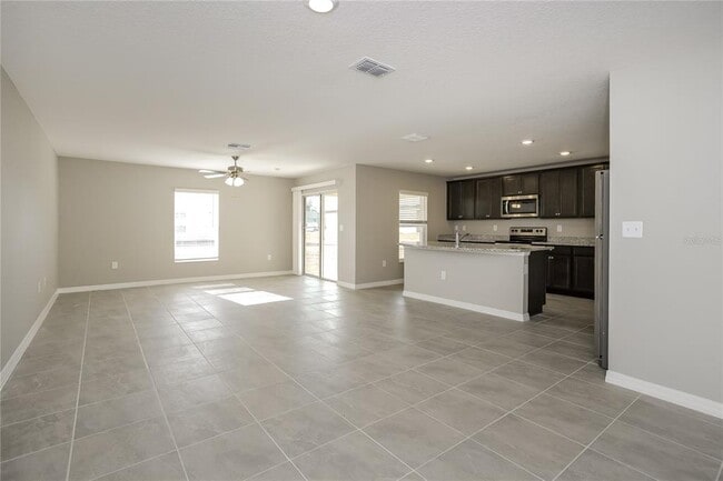 1698 Hideaway Flat St in Mascotte, FL - Building Photo - Building Photo