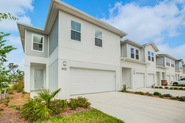 Encanto Isla | Townhomes for Rent in Kissimmee, FL - Building Photo - Building Photo