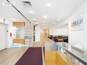 60 E 56th St in New York, NY - Building Photo - Building Photo