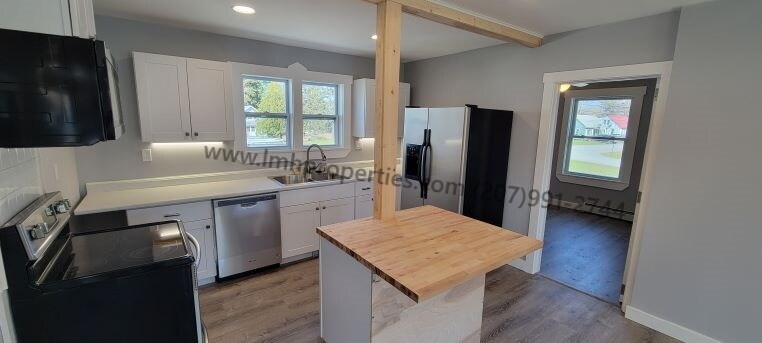 6 Woodman Ave in Fairfield, ME - Building Photo