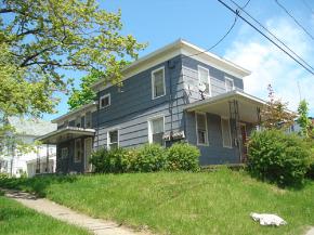 111 W Utica St in Oswego, NY - Building Photo