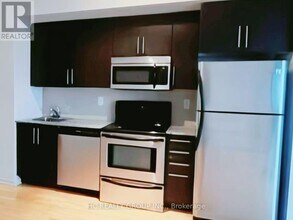 65-2465 Bremner Blvd in Toronto, ON - Building Photo - Building Photo