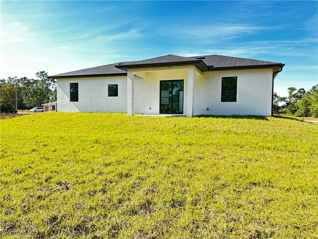 717 Genoa Ave S in Lehigh Acres, FL - Building Photo - Building Photo