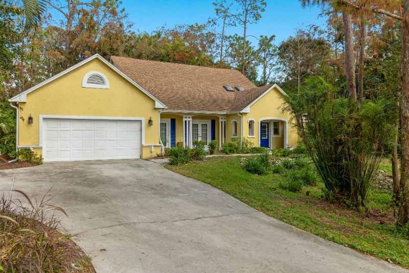 6150 Cypress Hollow Way in Naples, FL - Foto de edificio