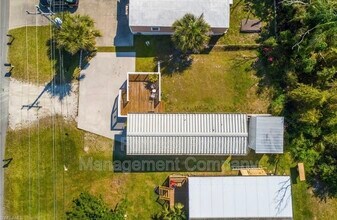 5667 Pine Island Rd NW in Bokeelia, FL - Building Photo - Building Photo