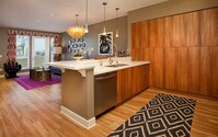 Kitchen with Stainless Steel Appliances and Hard Surface Flooring - The Hesby Apartments in Los Angeles, California