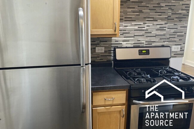 1253 W Henderson St, Unit 3 in Chicago, IL - Foto de edificio - Building Photo