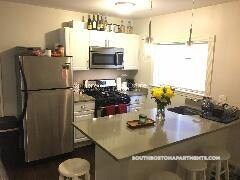 32 Rawson St, Unit 1 in Boston, MA - Building Photo