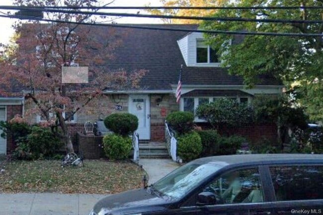 property at 203-06 53rd Ave