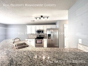 7603 Rolling Meadows Ln in Huntersville, NC - Building Photo - Building Photo