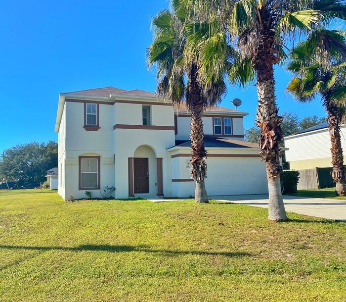 1931 Manatee Way in Poinciana, FL - Building Photo