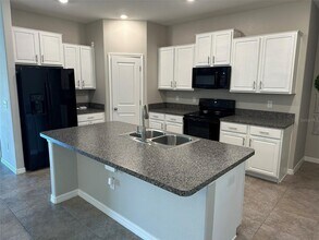 15438 Wicked Strong St in Sun City Center, FL - Building Photo - Building Photo