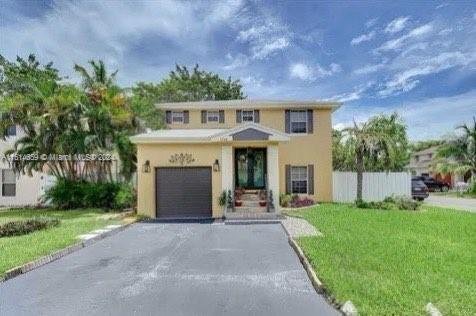 5788 Woodland Point Dr in Tamarac, FL - Building Photo