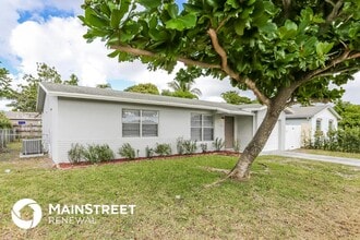 7715 Kimberly Blvd in North Lauderdale, FL - Building Photo - Building Photo