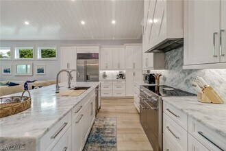 5130 Alpha Ct in Naples, FL - Building Photo - Building Photo