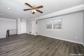 325 Lake Pointe Ct-Unit -130 in Middle Island, NY - Building Photo - Building Photo