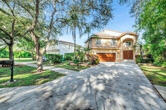 5911 NW 59th Ave in Parkland, FL - Building Photo - Building Photo