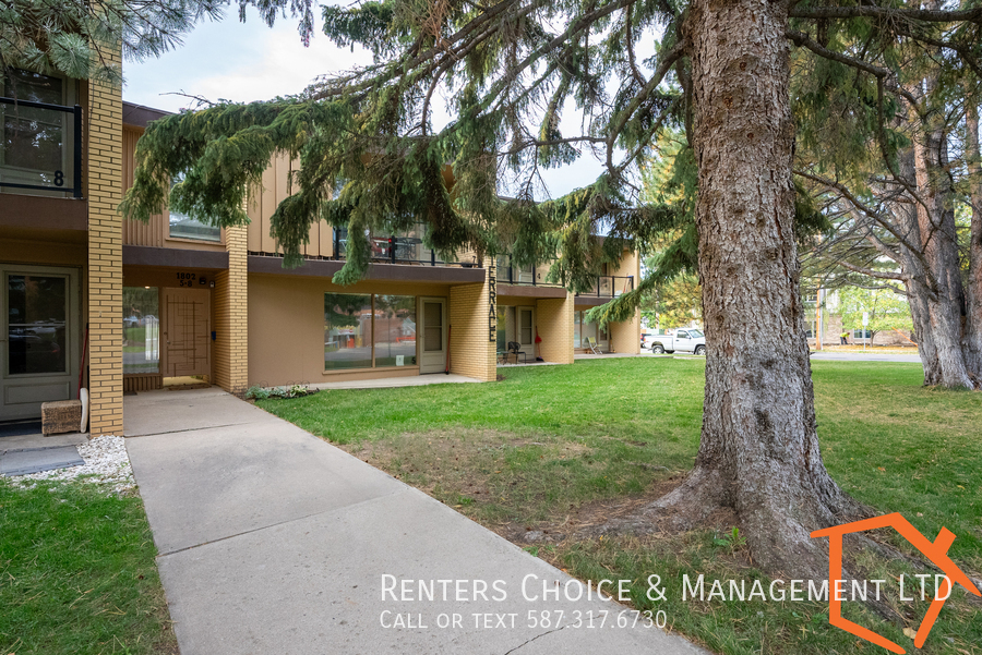 Second Floor Apartment with Assigned Parki... in Lethbridge, AB - Building Photo