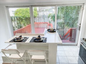 1135 Olive St in Baltimore, MD - Building Photo - Building Photo