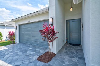 13468 SW Indigo Inlet Ln in Port St. Lucie, FL - Foto de edificio - Building Photo