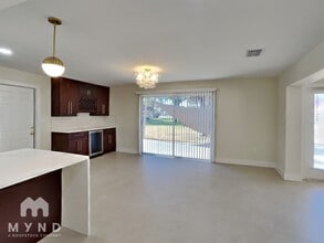 10100 Paradise Blvd in Treasure Island, FL - Building Photo - Building Photo