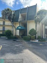 9090 Lime Bay Blvd in Tamarac, FL - Building Photo