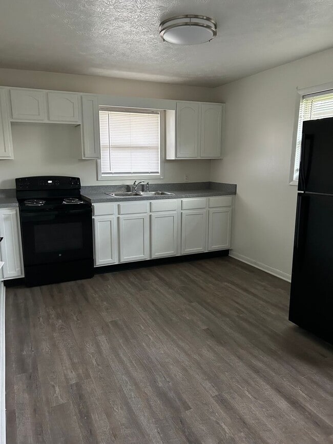 property at 7015-7017 Manor Dr N