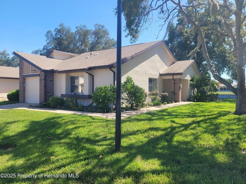 7559 Heather Walk Dr in Spring Hill, FL - Building Photo