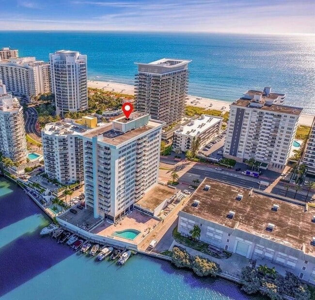 property at 5838 Collins Ave