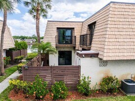 15307 W Pond Woods Dr in Tampa, FL - Building Photo
