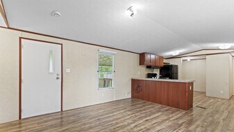 91 Maple Ln in Shepherd, TX - Building Photo